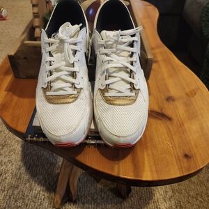 Nike White and Gold Athletic Shoes